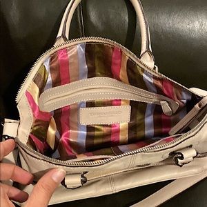Ivory leather handbag with striped interior